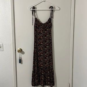 Small, black flower pattern dress.